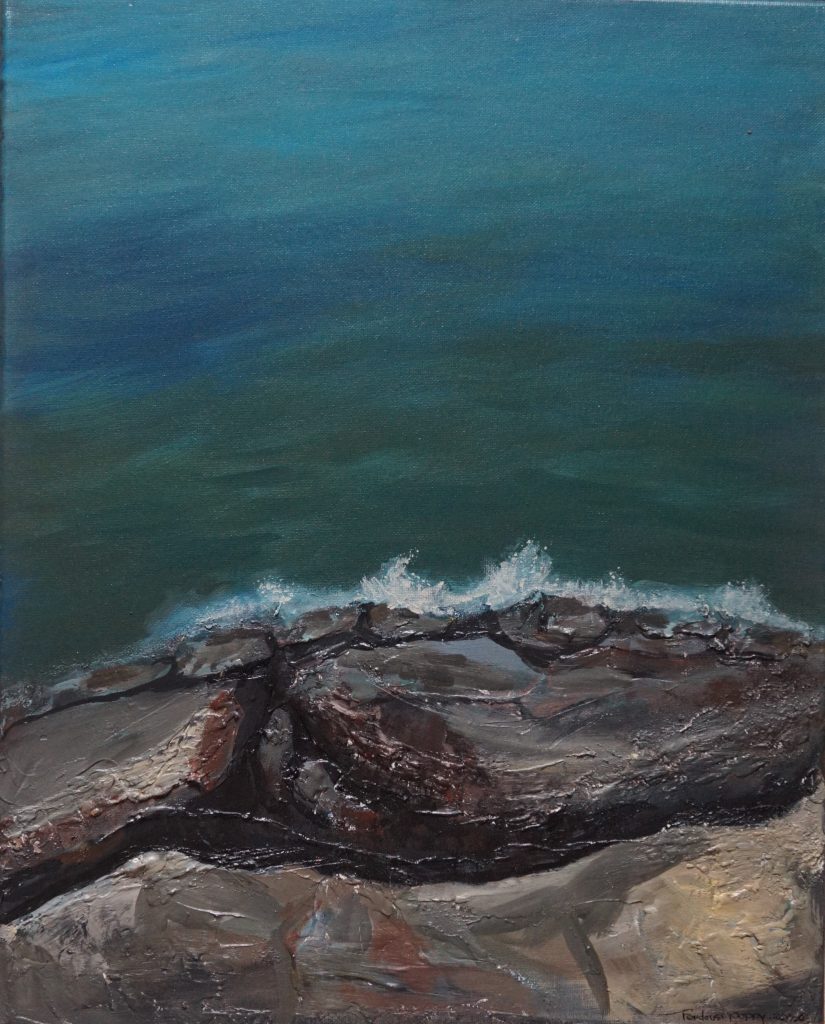 water splashing on rock