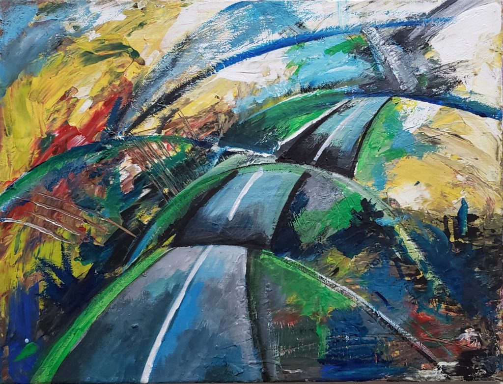 Road through nature and city