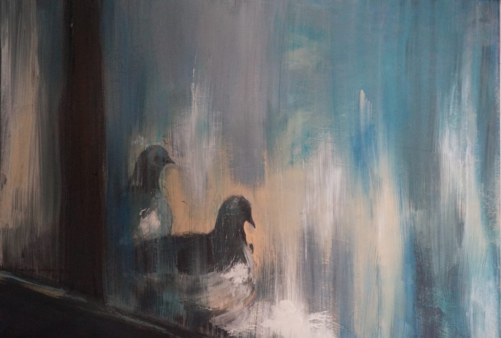 Two birds sitting on Window seal